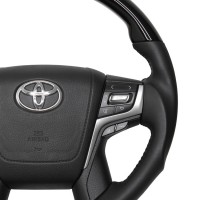 Руль в стиле рестайлинг II для Toyota Land Cruiser 200 2007-2021 с анатомией, черный лак, с подогревом